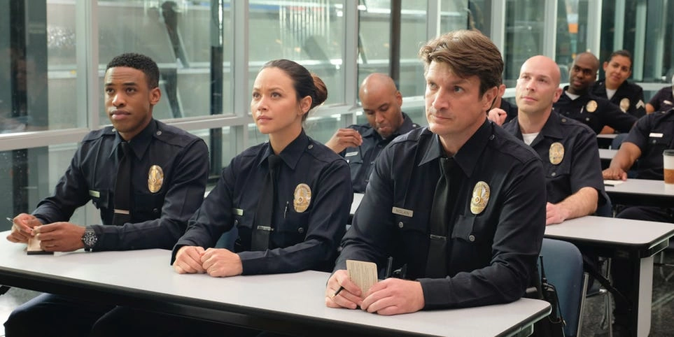 Titus-Makin-Jr.-Melissa-ONeil-and-Nathan-Fillion-in-The-Rookie.jpg